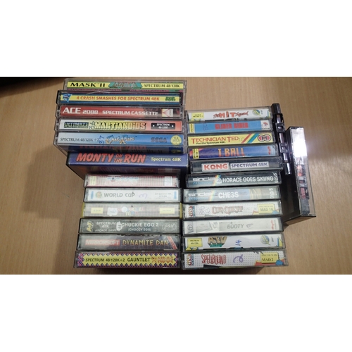 2077 - Quantity of Sinclaire Spectrum game cassettes, mostly cased. UK P&P Group 2 (£24+VAT for the first l... 