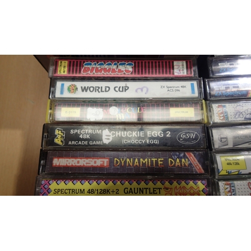 2077 - Quantity of Sinclaire Spectrum game cassettes, mostly cased. UK P&P Group 2 (£24+VAT for the first l... 