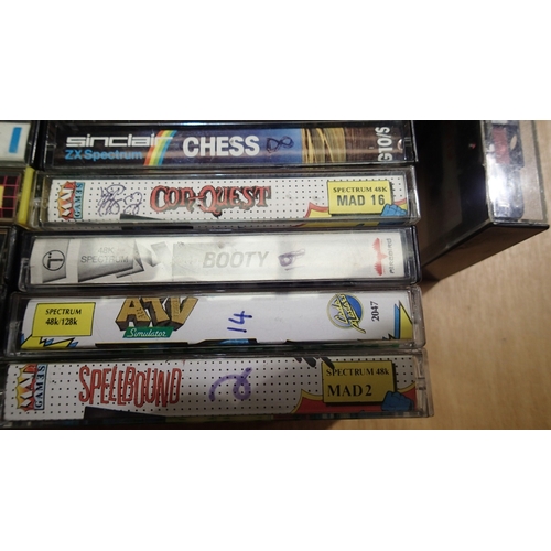 2077 - Quantity of Sinclaire Spectrum game cassettes, mostly cased. UK P&P Group 2 (£24+VAT for the first l... 