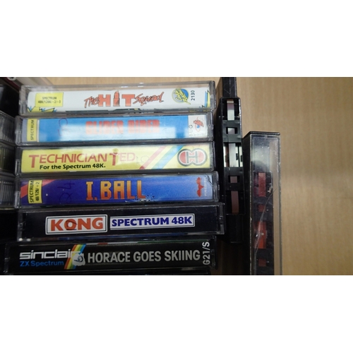 2077 - Quantity of Sinclaire Spectrum game cassettes, mostly cased. UK P&P Group 2 (£24+VAT for the first l... 