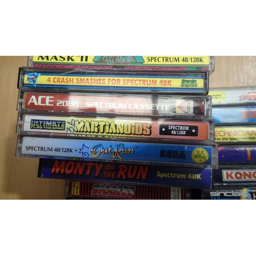 2077 - Quantity of Sinclaire Spectrum game cassettes, mostly cased. UK P&P Group 2 (£24+VAT for the first l... 