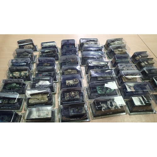 2340 - 40x Magazine issue military vehicles, approx 1/72 scale, all in packs, ex display models. Not availa... 