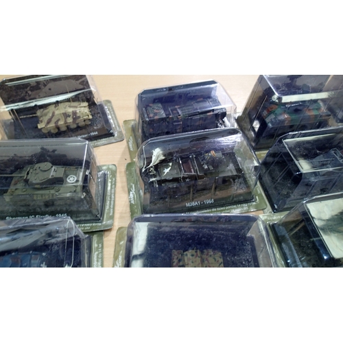 2340 - 40x Magazine issue military vehicles, approx 1/72 scale, all in packs, ex display models. Not availa... 