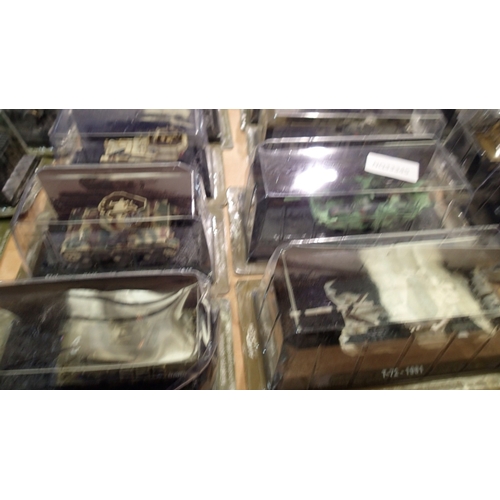 2340 - 40x Magazine issue military vehicles, approx 1/72 scale, all in packs, ex display models. Not availa... 