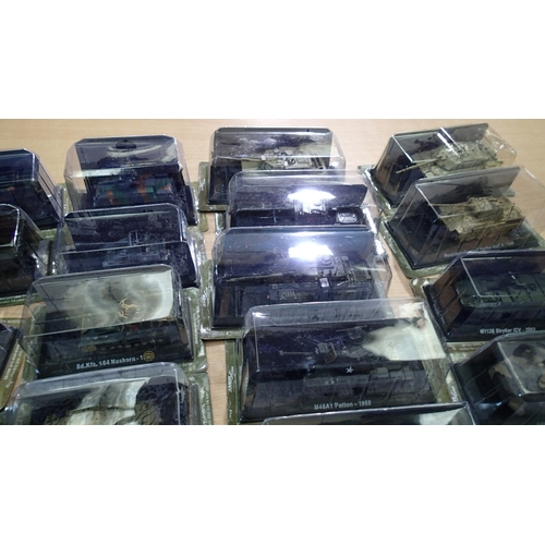 2340 - 40x Magazine issue military vehicles, approx 1/72 scale, all in packs, ex display models. Not availa... 