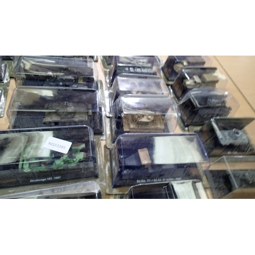 2340 - 40x Magazine issue military vehicles, approx 1/72 scale, all in packs, ex display models. Not availa... 