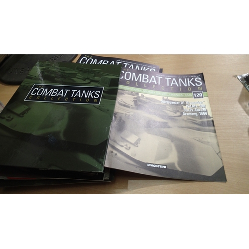 2340 - 40x Magazine issue military vehicles, approx 1/72 scale, all in packs, ex display models. Not availa... 