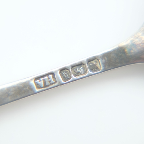 101 - Two silver brooches and a silver scalloped spoon, 13g combined. UK P&P Group 0 (£7+VAT for the first... 