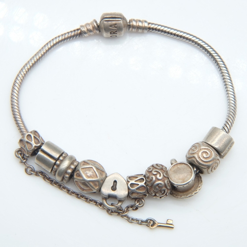 103 - 925 silver Pandora style bracelet with ten charms, 42g. UK P&P Group 0 (£7+VAT for the first lot and... 
