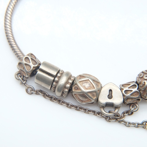 103 - 925 silver Pandora style bracelet with ten charms, 42g. UK P&P Group 0 (£7+VAT for the first lot and... 