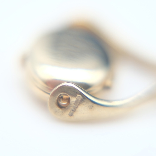 105 - 9ct gold spinner with locket, H: 30 mm, 2.4g. UK P&P Group 0 (£7+VAT for the first lot and £1+VAT fo... 