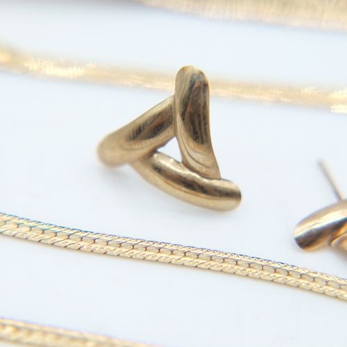 107 - Mix of 9ct gold damaged chains, five pairs of earrings, and one loose earring, 17.4g combined. UK P&... 