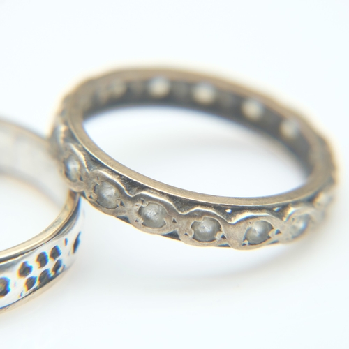 108 - Two 9ct gold bands both set with small stones, size J and size Q, 4.3g combined. UK P&P Group 0 (£7+... 