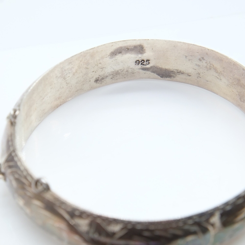 113 - Two silver bangles, a bracelet and a textured Accurist ladies wristwatch, 73g combined. UK P&P Group... 