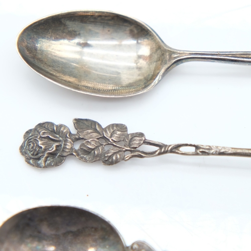 142 - Three silver teaspoons with decorated handles, 32g combined. UK P&P Group 1 (£18+VAT for the first l... 