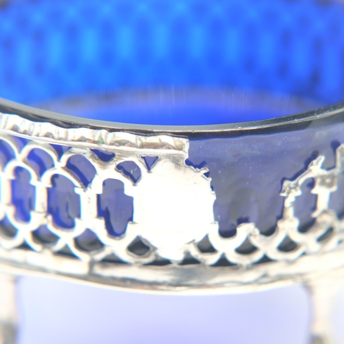 145 - Georgian hallmarked silver open salt with blue glass liner and vacant cartouche, chips to rim of gla... 