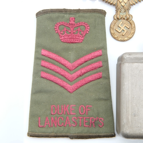 156 - Kriegsmarine tunic breast eagle with a gau badge in semi-relic condition, a Military gun oil bottle ... 