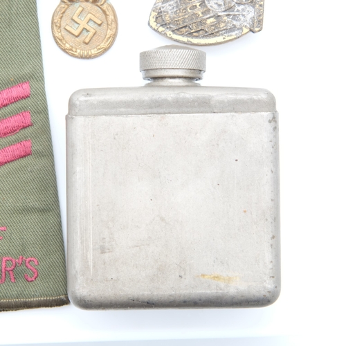 156 - Kriegsmarine tunic breast eagle with a gau badge in semi-relic condition, a Military gun oil bottle ... 