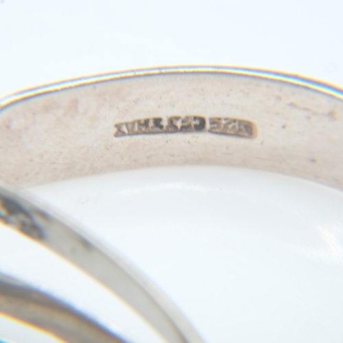 63 - Silver 'Peace' bangle and a triple bangle, 36g combined. UK P&P Group 0 (£7+VAT for the first lot an... 