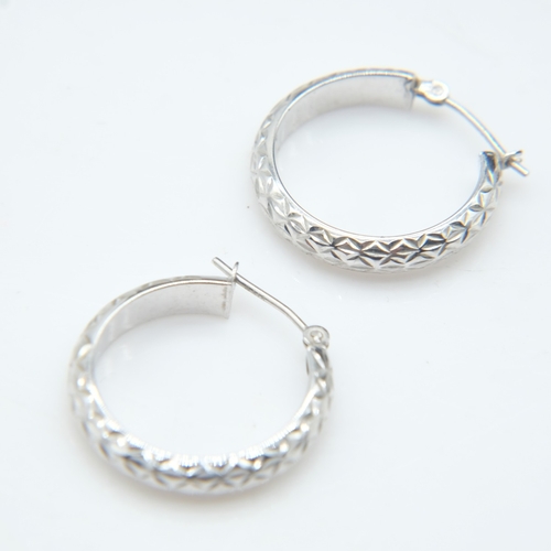 66 - Contemporary 9ct white gold pair of hoop earrings, 1.2g combined. UK P&P Group 0 (£7+VAT for the fir... 