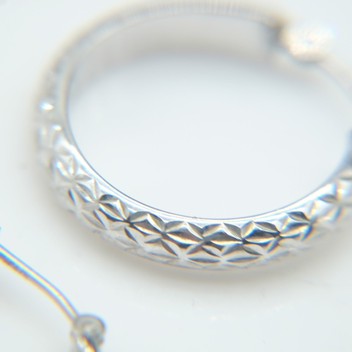 66 - Contemporary 9ct white gold pair of hoop earrings, 1.2g combined. UK P&P Group 0 (£7+VAT for the fir... 