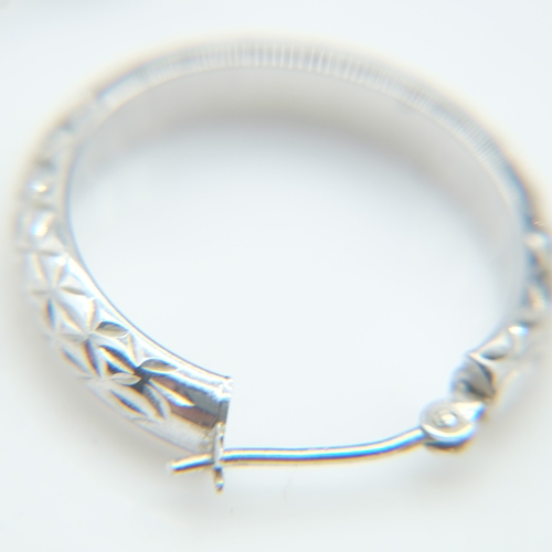 66 - Contemporary 9ct white gold pair of hoop earrings, 1.2g combined. UK P&P Group 0 (£7+VAT for the fir... 
