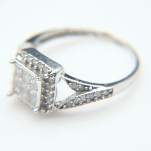 73 - 9ct white gold and diamond set cluster ring, size O, 2.4g. UK P&P Group 0 (£7+VAT for the first lot ... 