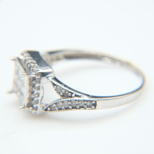 73 - 9ct white gold and diamond set cluster ring, size O, 2.4g. UK P&P Group 0 (£7+VAT for the first lot ... 