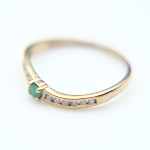 86 - Modern 9ct gold and emerald set solitaire ring with channel-set diamond shoulders, size Q, 1.5g. UK ... 