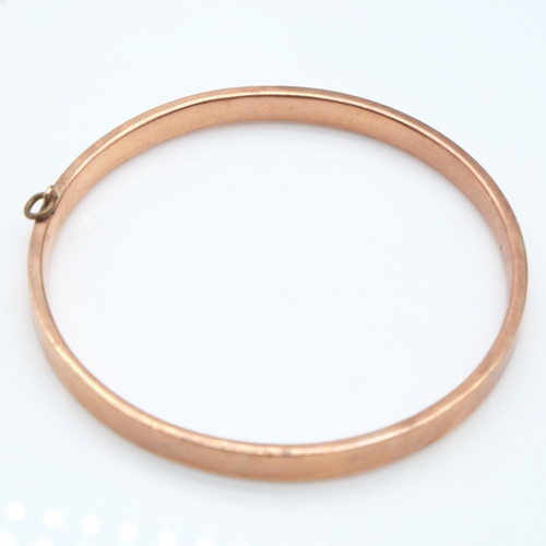 87 - 9ct rose gold bangle with pendant loop, 10.0g. UK P&P Group 0 (£7+VAT for the first lot and £1+VAT f... 