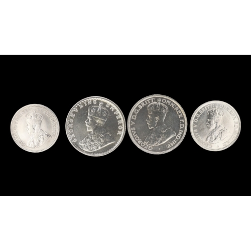 2168 - Four silver high grade territories coins of George V. UK P&P Group 0 (£7+VAT for the first lot and £... 