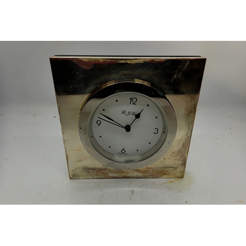 1093 - Sterling silver framed bedside clock. UK P&P Group 1 (£18+VAT for the first lot and £2+VAT for subse... 