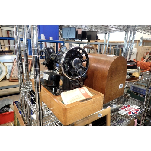 1358 - Oak cased singer sewing machine with foot pedal and motor. All electrical items in this lot have bee... 