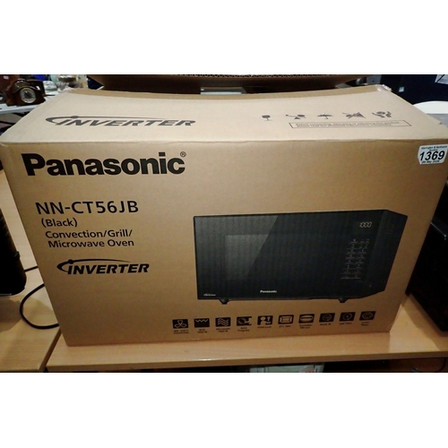 1369 - Boxed Panasonic microwave oven, appears unused-NN-CT56JB. All electrical items in this lot have been... 