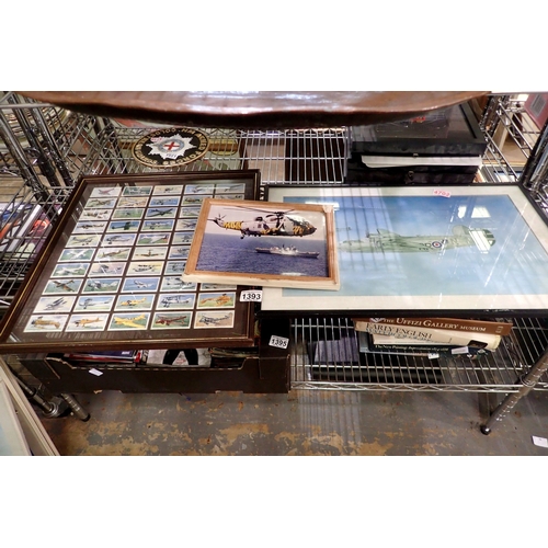 1393 - Three military framed pictures and prints to include RAF heavy bomber and framed military tea cards.... 