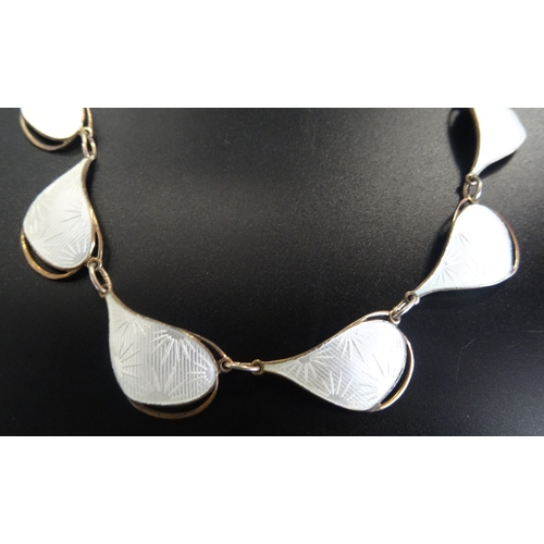 6 - NORWEGIAN ENAMEL DECORATED SILVER GILT NECKLACE
the teardrop shaped links with white enamel decorate... 