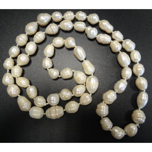 48 - BAROQUE PEARL NECKLACE
approximately 82cm long