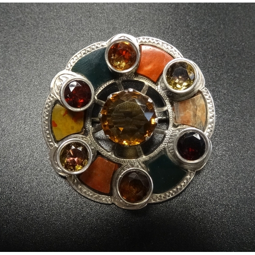 70 - VICTORIAN GEM AND STONE SET UNMARKED SILVER BROOCH
the central round cut citrine surrounded by colou... 