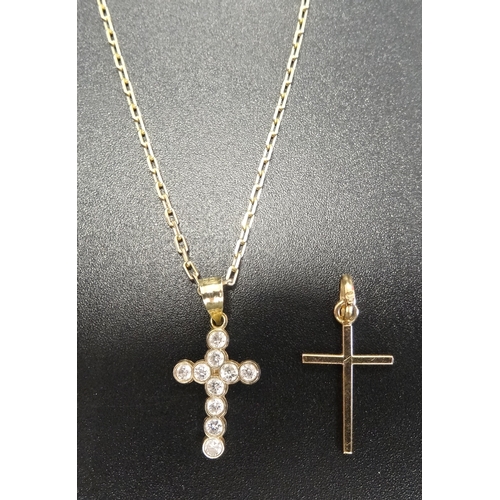 72 - CZ SET NINE CARAT GOLD CROSS PENDANT
on nine carat gold chain; together with another nine carat gold... 