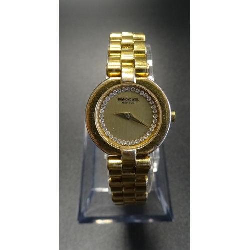 99 - LADIES RAYMOND WEIL GOLD PLATED WRISTWATCH
the gilt dial set with diamonds, on gold plated bracelet ... 