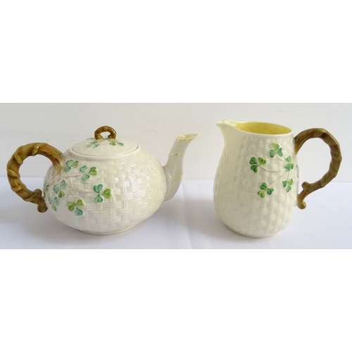 186 - 'BELLEEK' PORCELAIN TEAPOT
with shamrock and basket weave decoration, bearing third black mark to ba... 