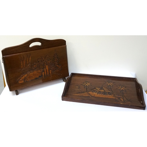 222 - MALAYSIAN TEAK TRAY
with raised sides and shaped carrying handles, with carved decoration, 51cm wide... 