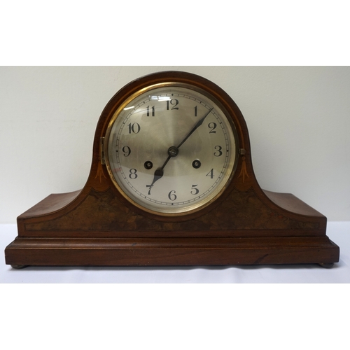 227 - NAPOLEAN HAT WALNUT MANTLE CLOCK
with a circular silvered dial with Arabic numerals and an eight day... 