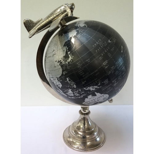 245 - TERRESTRIAL DESK GLOBE
mounted on a chrome stand with a propeller plane finial, 38cm high