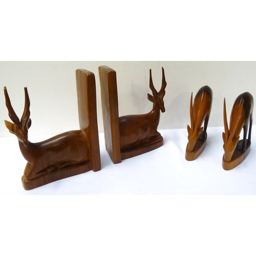 265 - PAIR OF CARVED AFRICAN HARDWOOD BOOKENDS
in the form of recumbent Impala, together with a pair of ca... 