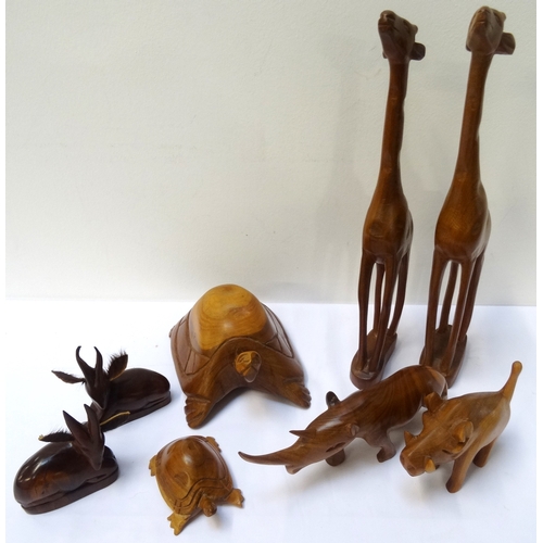 269 - SELECTION OF CARVED AFRICAN HARDWOOD ANIMALS
including two giraffes, 32.5cm high, two recumbent Impa... 