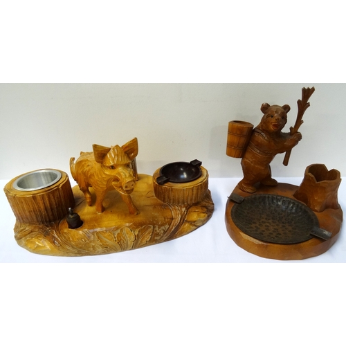 271 - BLACK FOREST CARVED SMOKING COMPANION
with a shaped rustic plinth with a carved wild boar flanked by... 