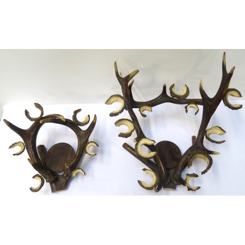 278 - PAIR OF ANTLER CANDELABRA
each of irregular form with multiple tea light holders around a central ca... 