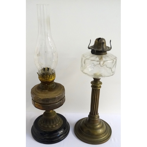 286 - VICTORIAN OIL LAMP
raised on a circular stepped base with twisted column to a glass reservoir; toget... 