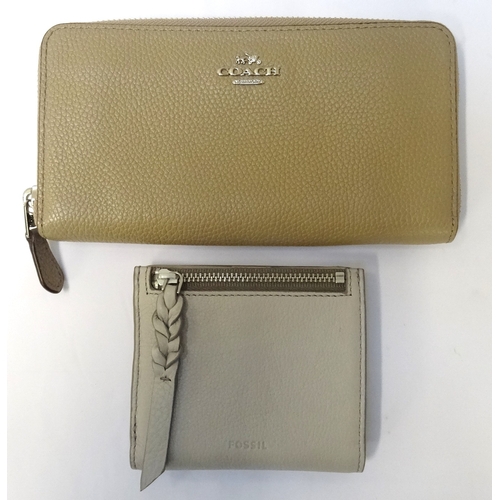 313 - NEW AND UNUSED COACH LEATHER WALLET
mushroom coloured and with original protective bag; together wit... 